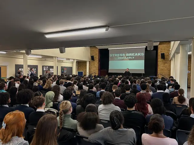 A Simple Six stress breaks slide in a full hall